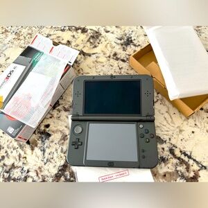 Nintendo 3DS XL black 
Like new